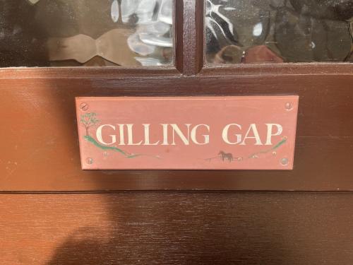 a sign on a door that says gluing gap at Gilling Gap in York