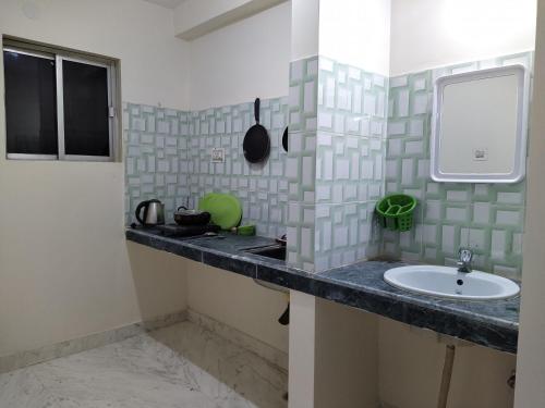 Kuchyň nebo kuchyňský kout v ubytování SARA Beach House
