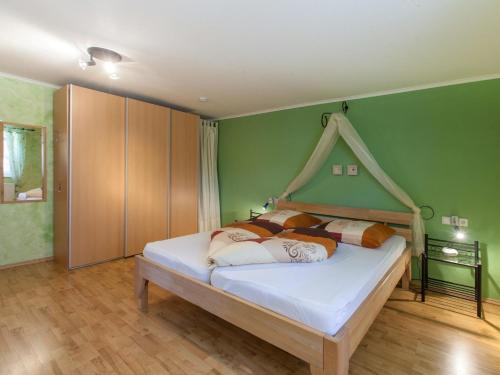 En eller flere senger på et rom på Ferienhof Katzenmaier
