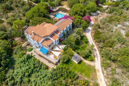 an aerial view of a house with a swimming pool at La Salvia Hotel Kas in Kas