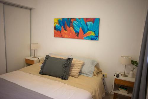 Postel nebo postele na pokoji v ubytování Departamento Premium con cochera y piscina