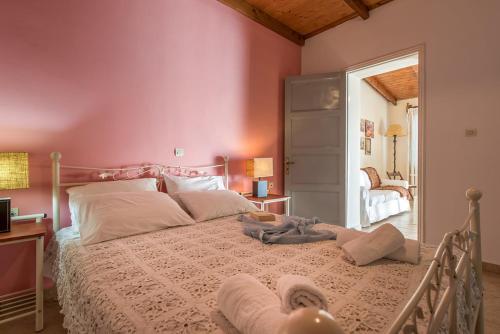 Кровать или кровати в номере Lofos Soilis