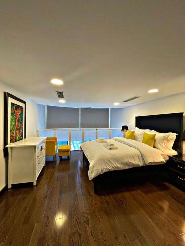 Voodi või voodid majutusasutuse Stunning Duplex Studio in JLT toas