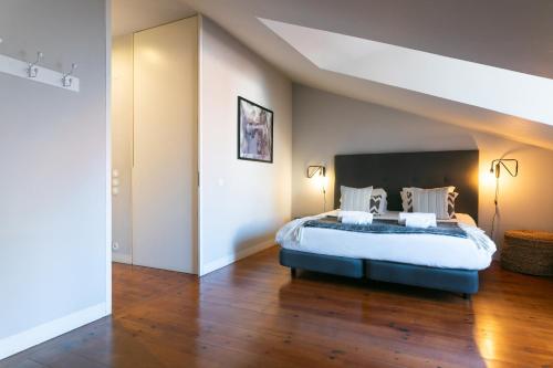 Ένα ή περισσότερα κρεβάτια σε δωμάτιο στο Lisbon Five Stars Apartments Combro 7