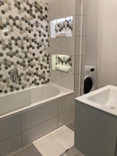A bathroom at Carina Apartment