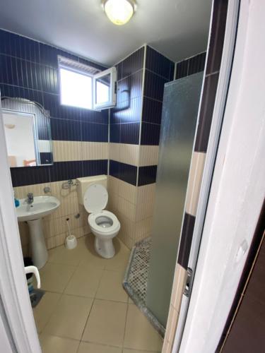 Ένα μπάνιο στο Etna Apartments