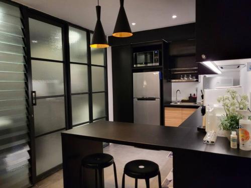Cucina o angolo cottura di Empire Damansara Designer Soho Karaoke & Netflix