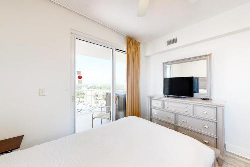 Кровать или кровати в номере Ariel Dunes I 0710
