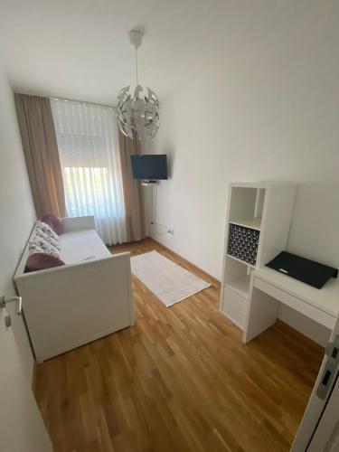 a living room with a couch and a table at Ušće in Valjevo
