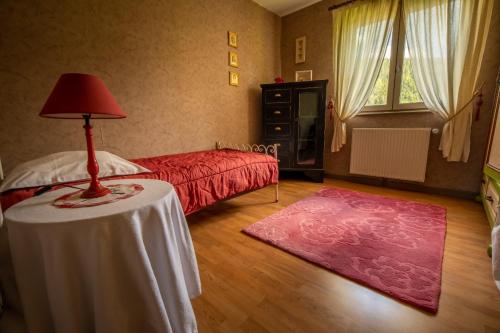 Katil atau katil-katil dalam bilik di Chalet Les 3 Chênes Xonrupt-Longemer à 2 pas de GERARDMER et des lacs