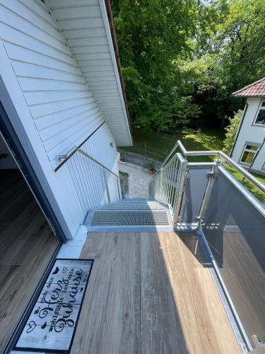 a stairway leading up to a house with a porch at Gästehaus Miri in Lindau