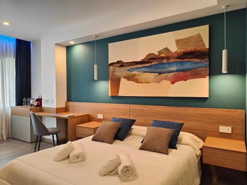 Postel nebo postele na pokoji v ubytování Carducci Art Guesthouse