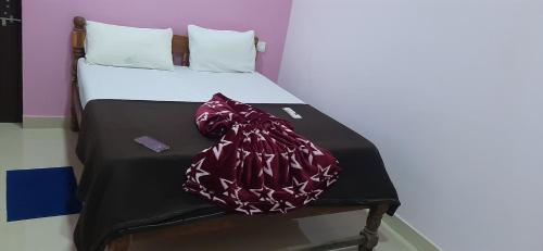 En eller flere senge i et værelse på Pihu Studio room