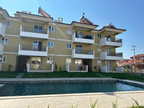 Brand new apartment with pool in Ortaca