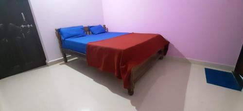 En eller flere senge i et værelse på Pihu Studio room