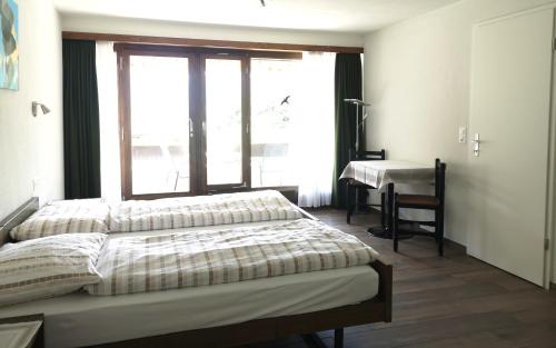 Cama o camas de una habitación en Aparthotel Résidence Bernerhof