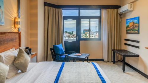 Postel nebo postele na pokoji v ubytování Hotel Sapphire