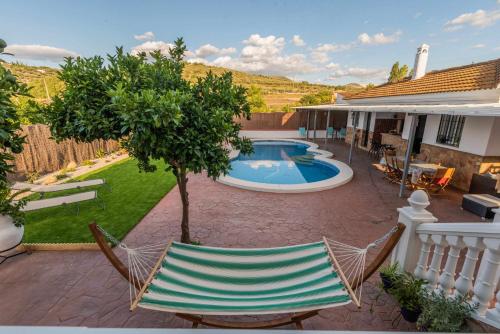 Het zwembad bij of vlak bij El Patio Descubre la casa perfecta para tu grupo