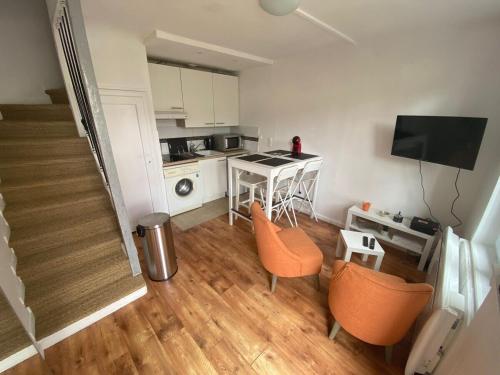 Η κουζίνα ή μικρή κουζίνα στο Maison Triplex du jardin des plantes