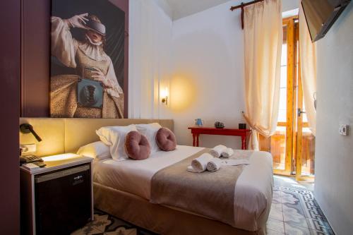 Postel nebo postele na pokoji v ubytování Les Monges Palace Boutique