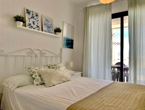 Posteľ alebo postele v izbe v ubytovaní Urb Las Cañas Apartamento F1