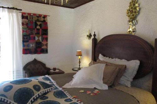 Cama o camas de una habitación en Terraços da Beira