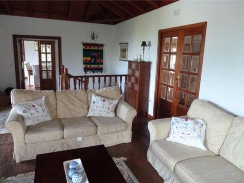Posezení v ubytování Spacious characterful villa with spectacular views in quiet rural setting.
