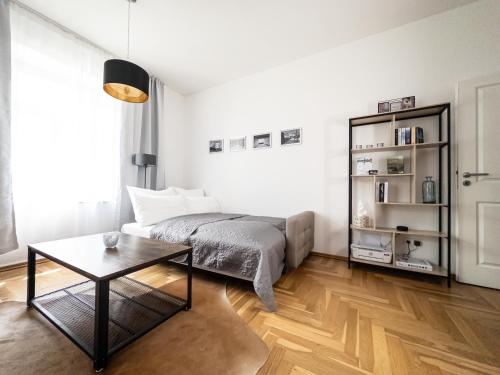 Voodi või voodid majutusasutuse FirstClass 2-Room-Apartment toas