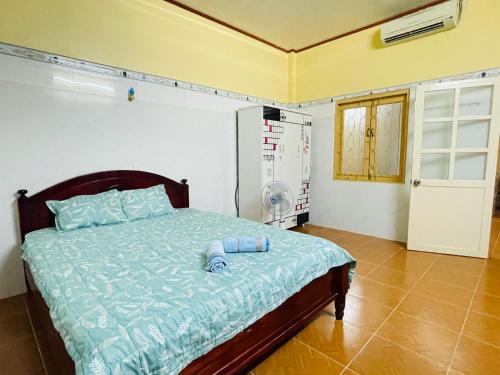 Cama ou camas em um quarto em Homestay nguyên căn riêng tư 2 phòng ngủ