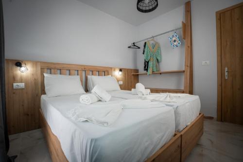Ένα ή περισσότερα κρεβάτια σε δωμάτιο στο Aggire Zante Luxury Residence