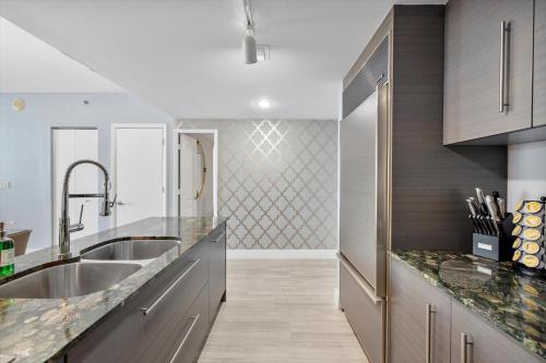 a kitchen with a sink and a counter at Special Offer at Icon Brickell with Ocean view in Miami