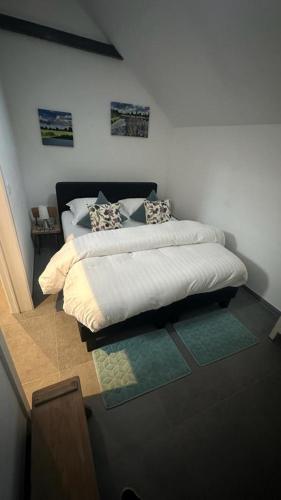 Ένα ή περισσότερα κρεβάτια σε δωμάτιο στο Bed & Bets!