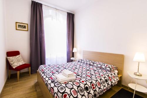 Posteľ alebo postele v izbe v ubytovaní Colossehome - Dream House around the corner from Colosseum