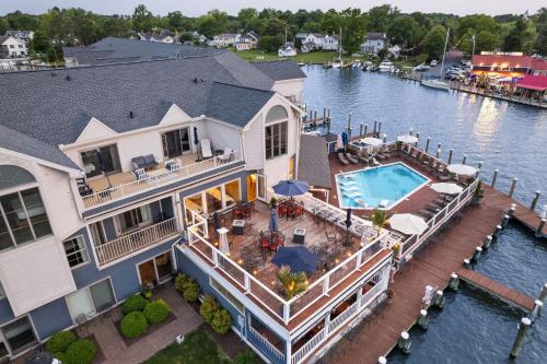 an aerial view of a house on the water at St Michaels Harbour Inn, Marina and Spa in Saint Michaels