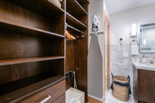 a bathroom with a shower and a sink at Treasure Mountain Inn in Park City