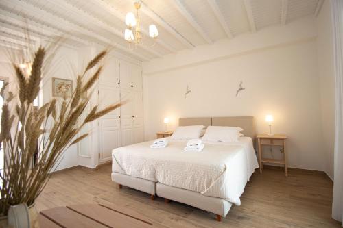 Postel nebo postele na pokoji v ubytování Crystal View Mykonos