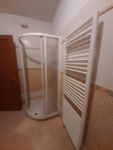 a bathroom with a shower in a room at La casa di Amelia in Borzonasca
