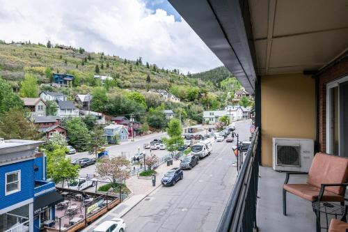 a view of a city street from a balcony at Treasure Mountain Inn in Park City