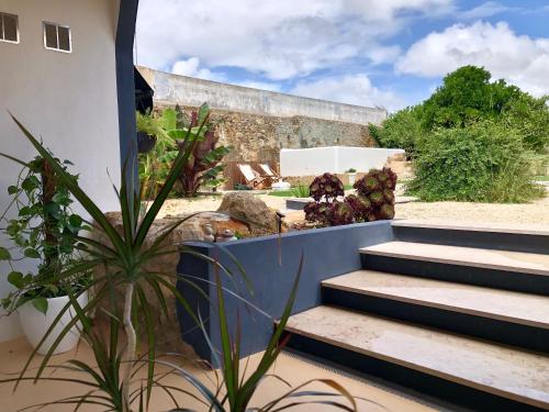 a view from the outside of a house with stairs at Pool oasis with private parking -Vigia 8 in Torres Vedras