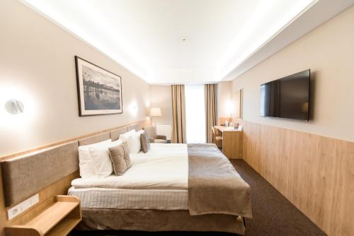 Nota Bene Hotel & Restaurantにあるベッド