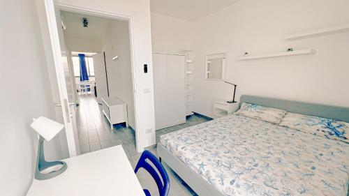 Postel nebo postele na pokoji v ubytování Zagare & Mare