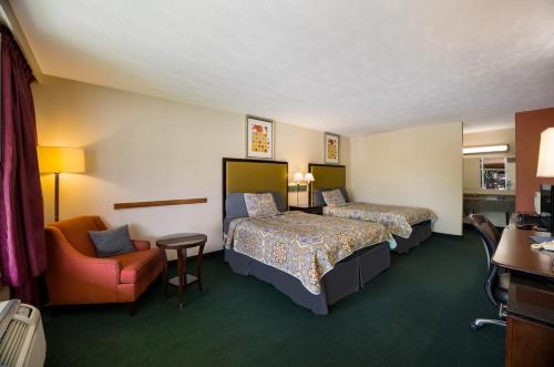 Ein Bett oder Betten in einem Zimmer der Unterkunft Travelodge by Wyndham Oakley