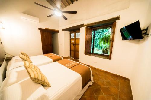 Bohemia Hotel Boutiqueにあるテレビまたはエンターテインメントセンター
