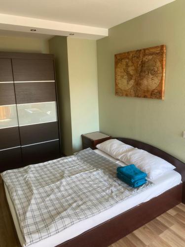 Ένα ή περισσότερα κρεβάτια σε δωμάτιο στο Apartament Tallinas 9