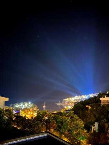 a view of a city at night at Apartments Albin in Ulcinj