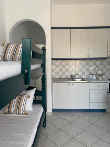 A kitchen or kitchenette at Fabrika Apartments