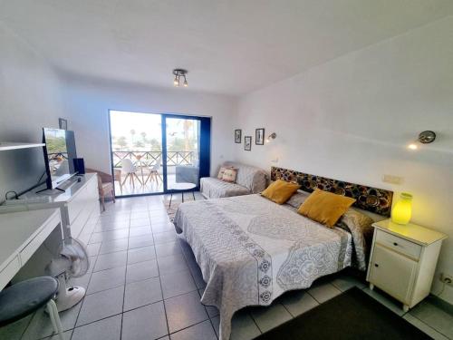 Postel nebo postele na pokoji v ubytování Luxury Ocean View Playa Roca