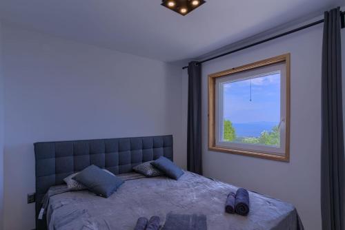 Кровать или кровати в номере Vila Podkalac