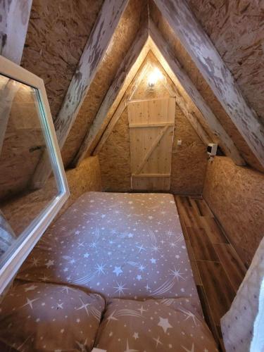 an overhead view of a small room in a attic at Bungalows Malagić in Gusinje