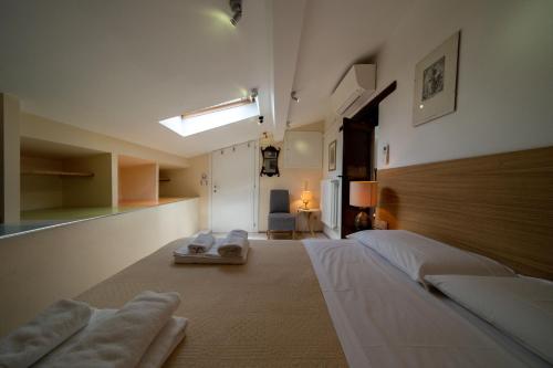 Un pat sau paturi într-o cameră la Orvieto in Terrazza